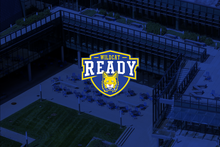 Wildcat Ready logo with a wildcat head centered over a blue-tinted aerial view of a University of Kentucky campus courtyard with outdoor tables, grass, and surrounding modern buildings.