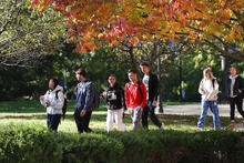 Students walking on campus. 