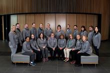 Members of the University of Kentucky RADOR-KY research team pose for a group photo in a modern building interior.