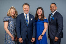 The 2025-26 UK Alumni Association officers are, from left, Jill H. Smith, secretary; Thomas K. Mathews, president; Kelly Sullivan Holland, president-elect; and Quentin R. Tyler, treasurer. Photo by Scott Hayes.