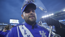 Carson Kitts, with his sousaphone, takes to the field before a recent University of Kentucky Football game. | Benjamine Branscum, UK Video 