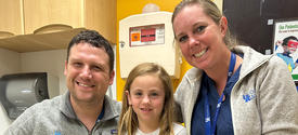 Image of Caroline Cain with her care team