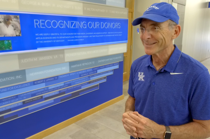 UK President Eli Capilouto in front of donor wall inside Jacobs Science Building