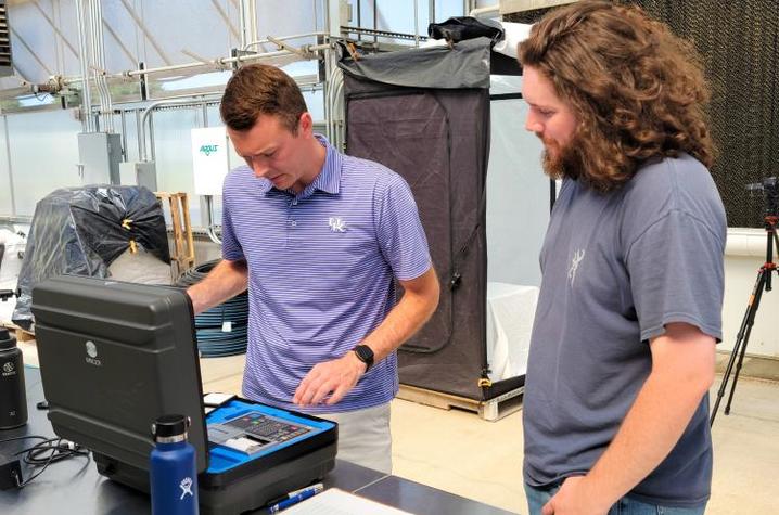 UK horticulture professor Garrett Owen works with UT plant science senior William Smith to study hydroponic lettuce at the UK Horticultural Research Farm. Photo by Aimee Nielson, UK Agricultural Communications Specialist