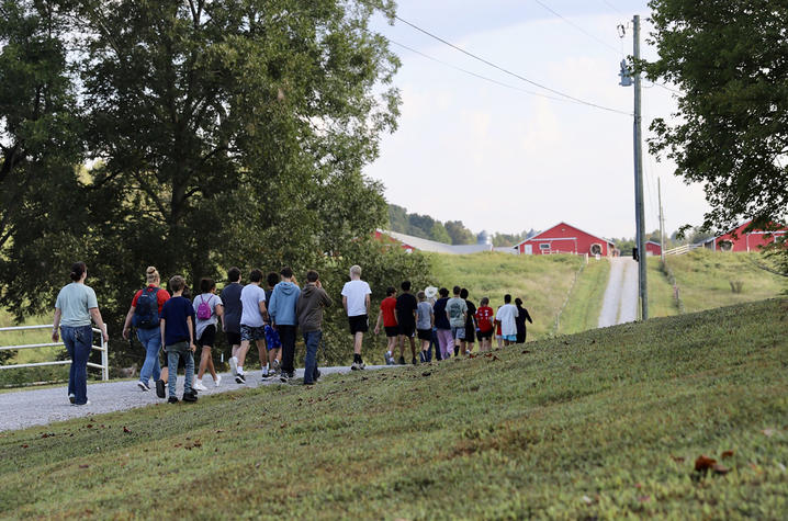 Students walk to the poultry barns