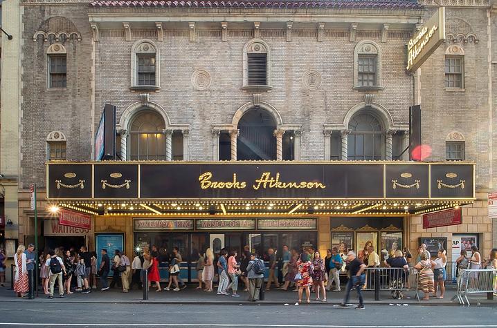 photo of people under marquee at Brooks Atkinson Theater during Waitress run