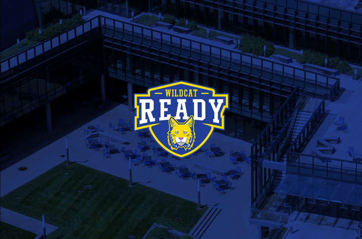 Wildcat Ready logo with a wildcat head centered over a blue-tinted aerial view of a University of Kentucky campus courtyard with outdoor tables, grass, and surrounding modern buildings.