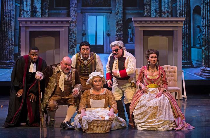 photo of Audrey Belle Adams (seated center) performing in "The Barber of Seville" with UK Opera Theatre