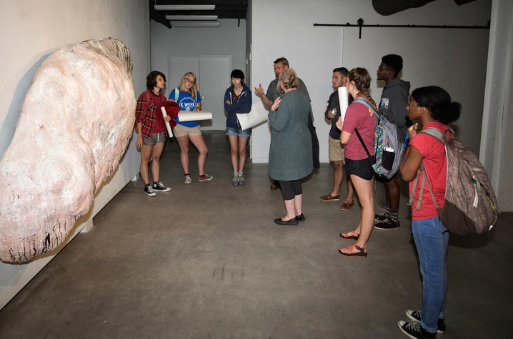 photo of group discussing sculpture - “Faculty Series: Vol. I” 