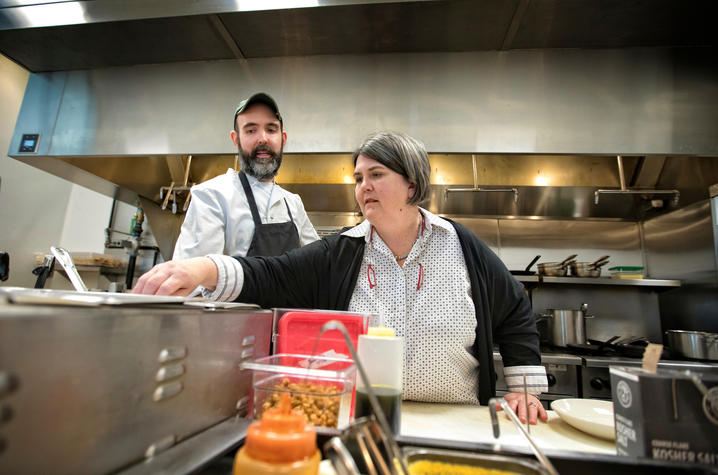photo of Chef Josh Smouse and Ouita Michel in Honeywood kitchen