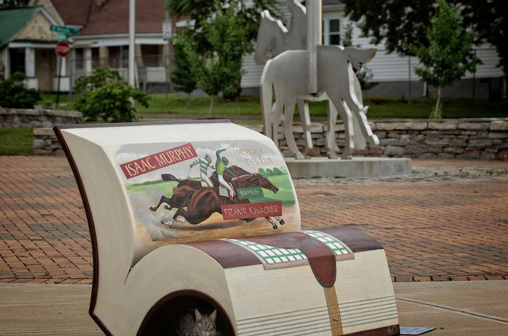 photo of book bench for "Isaac Murphy: I Dedicate This Ride" by Isaac Murphy sculpture