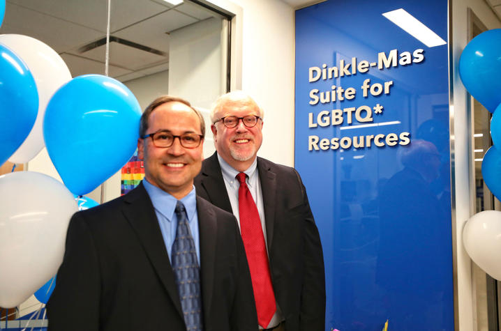 Jim Dinkle (right) and his partner Carlos Mas Rivera celebrate at the Dinkle-Mas Suite for LGBTQ* Resources 