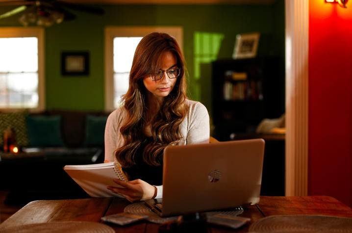 Photo of woman using a computer.