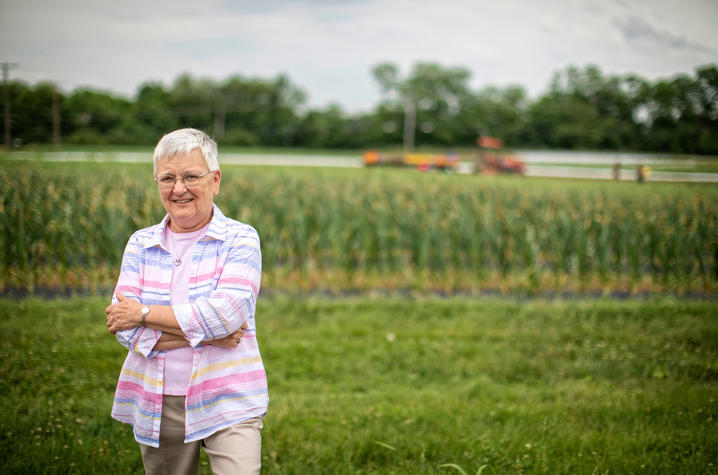 Photo of Deborah Reed in a field