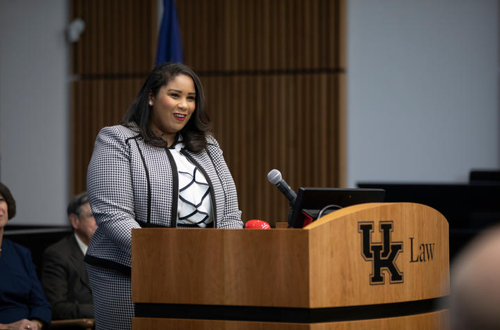 Chynna Hibbitts speaks at podium