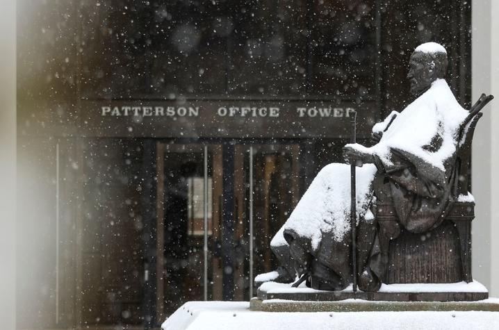 a statue of UK President James K. Patterson covered in snow