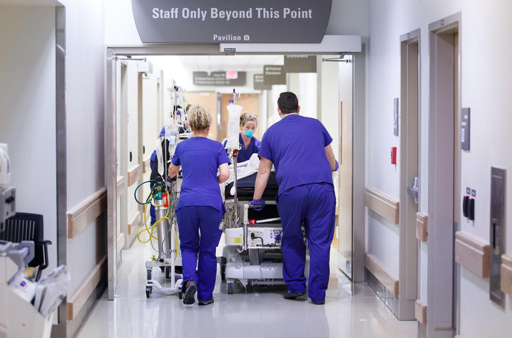 Staff at the Albert B. Chandler Hospital work with Covid-19 patients in April 2020 . Photo by Mark Cornelison | UK photo