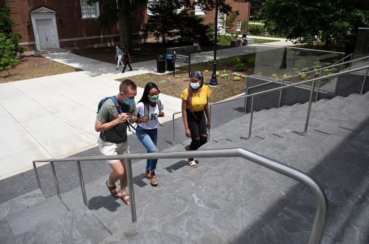 Photo of students walking up stairs