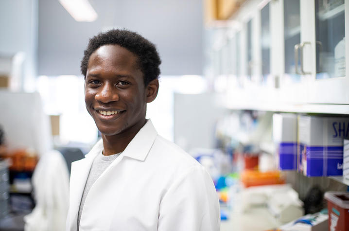 Mirindi Kabangu, a student under Dr. Randal Voss, conducting research in Voss' lab. Photo by Pete Comparoni | UKphoto