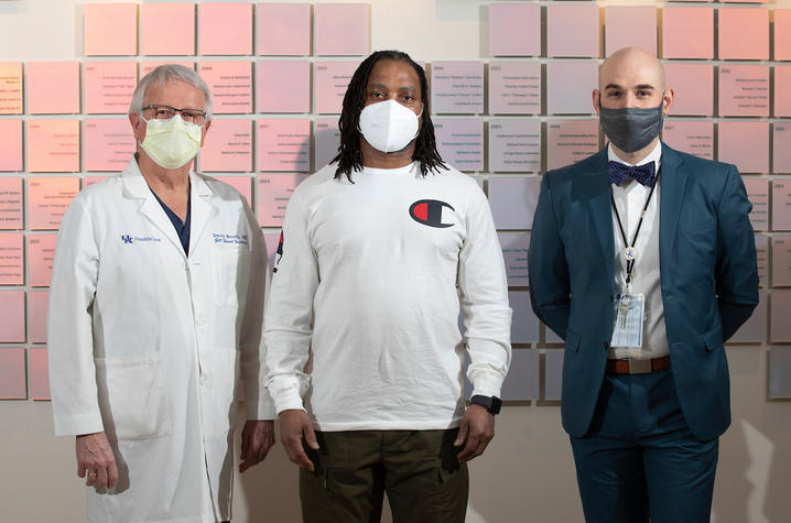 Charles Hill, center with his Doctors, David Booth, left and Andrew R. Kolodziej, right, on February 12, 2021. Photo by Mark Cornelison | UKphoto