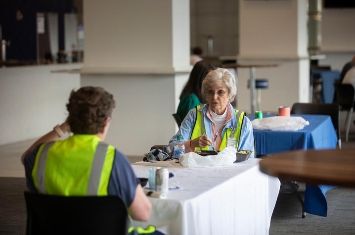 Photo of vaccine clinic volunteers receiving lunch