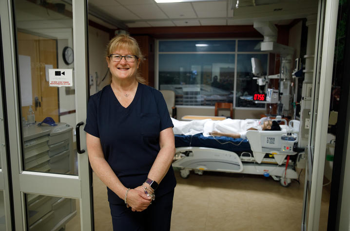 Photo of Lynn Kelso in teaching simulation center