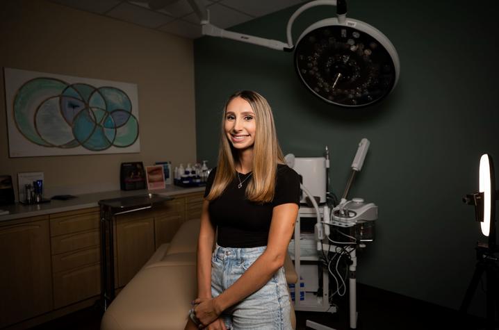 photo of Sarah Sbert in patient room at Aesthetics Center