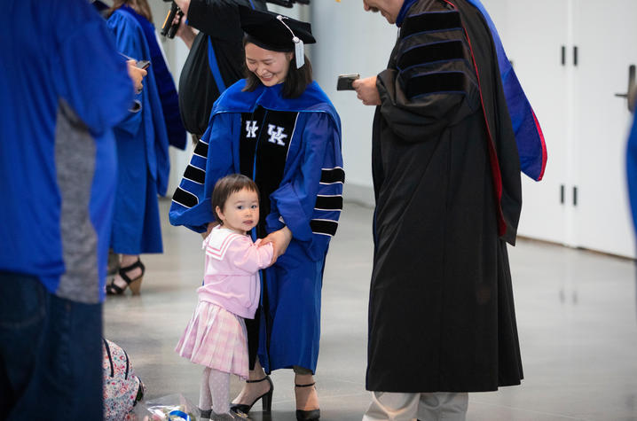 This is a photo of a new University of Kentucky graduate with her biggest fan during Commencement (May 2022).