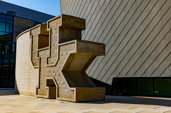 The Gatton Student Center and the large UK stone sign.