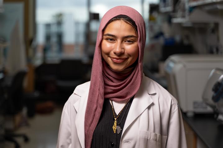 Elaf Ghoneim stands for a portrait in the Van Eldik Lab