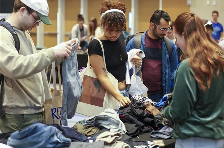 UK students browsing at the 2024 Thrift Shop Pop Up. 