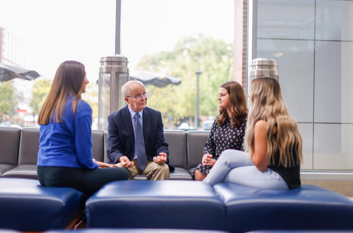 Robert Kuhn with members of PediaKATS, a group of pharmacy students he mentors. PediaKATS’s main effort is to advocate for the proper health education of pediatric patients and their caregivers in the greater Lexington area. Mark Cornelison | UKphoto