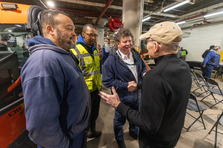 This is a photo of UK President Eli Capilouto meeting with PPD employees. 