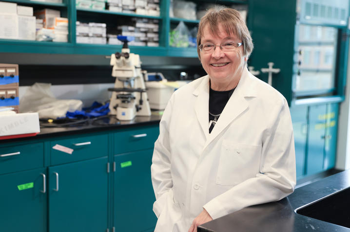 Linda Van Eldik, Ph.D., director of the University of Kentucky Sanders-Brown Center on Aging, stands in a research laboratory.