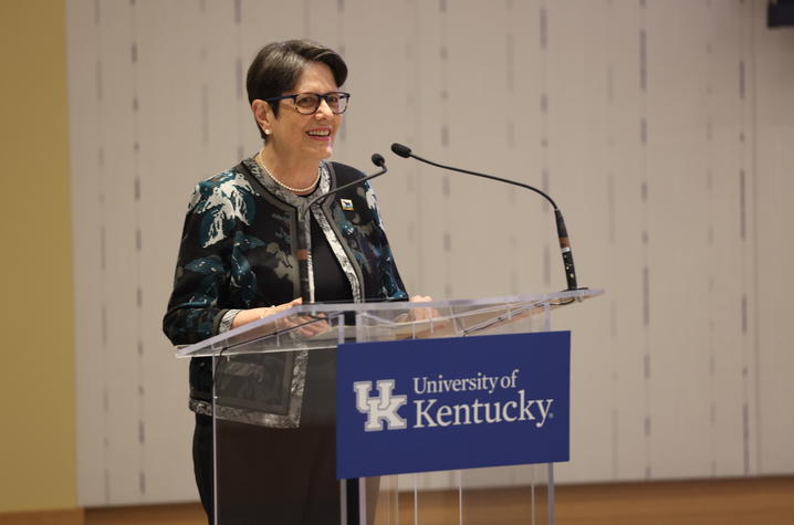 photo of Lexington Mayor Linda Gorton at podium with UK logo