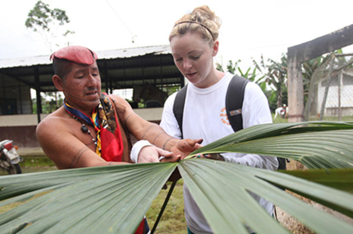 photo of Shoulder to Shoulder student working with man in Ecuador