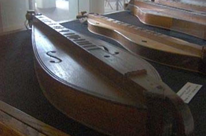 Different styles of Appalachian dulcimers on display