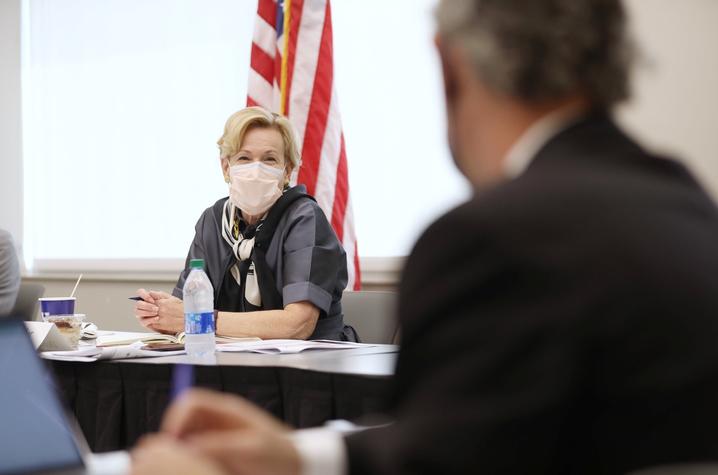 photo of Deborah Birx wearing a maxk during a roundtable discussion