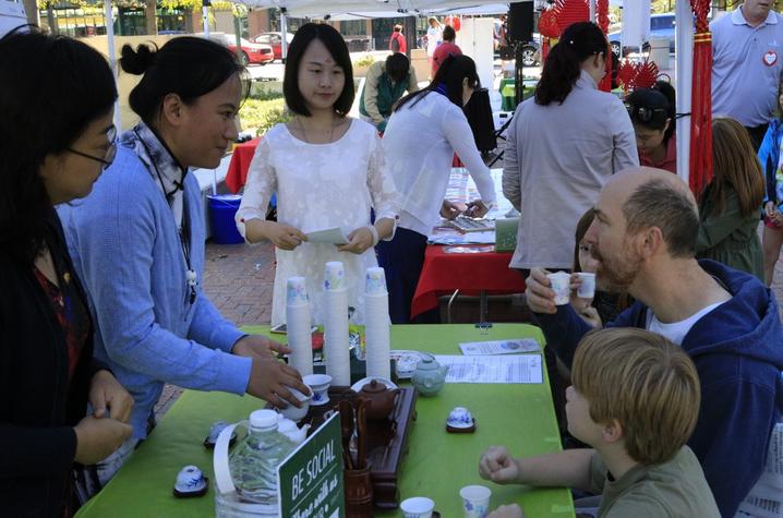 photo of father and son at 2017 Confucius Institute Day booth
