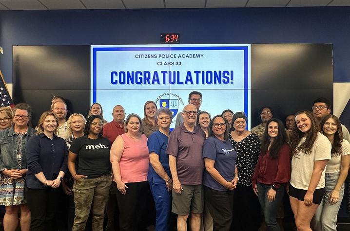 A photo of the 2024 CPA graduating class standing in the Emergency Operations Center