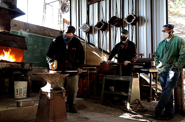 photo of a masked Jeremy Colbert and 2 masked students