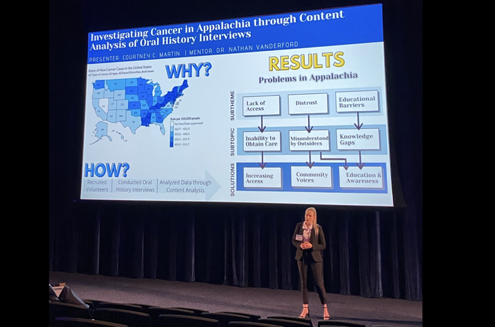 UK student Courtney Martin presents at the 5-Minute Fast Track Research Competition.