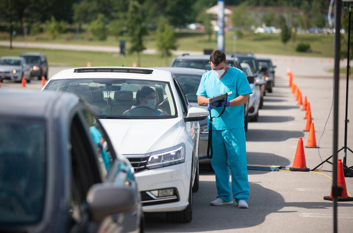 photo of cars in line for people to be tested