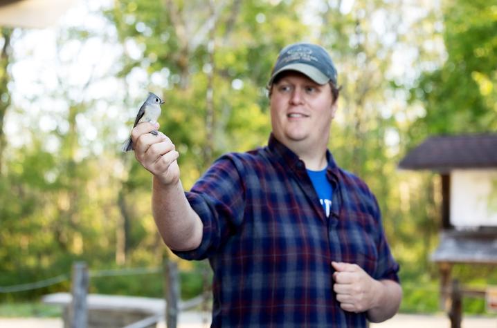 Darin "DJ" McNeil leading a bird banding demonstration Darin "DJ" McNeil leading a bird banding demonstration