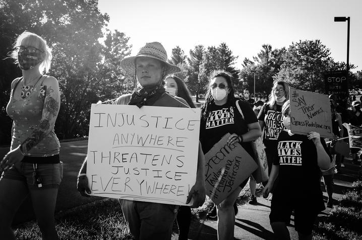 black and white Alethea Devary photo of protest