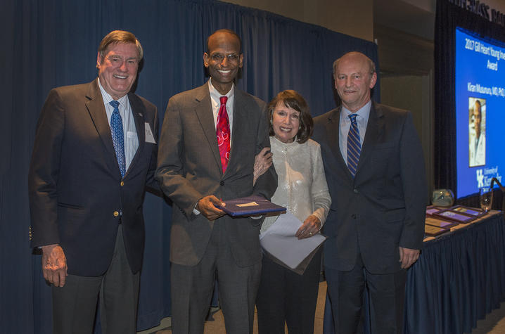 Photo of Saha Cardiovascular Research Center Director Alan Daugherty, featured speaker and Gill Award recipient Kiran Musunurum and UK benefactors Jack and Linda Gill