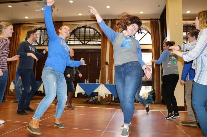 people dancing at a previous DanceBlue Dance Party held at the Boone Center.