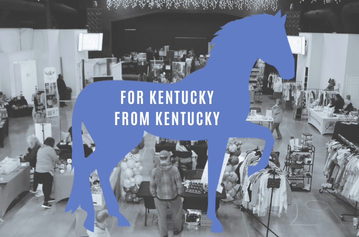 View of vendor fair Overhead view of an indoor market or vendor fair with booths displaying clothing, crafts and products while people browse and shop. A large blue silhouette of a horse is overlaid in the center with the words “FOR KENTUCKY FROM KENTUCKY.”