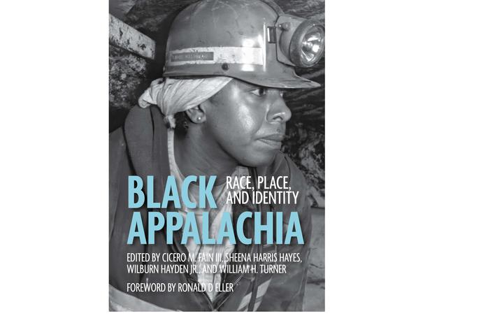 Book cover for “Black Appalachia: Race, Place, and Identity.” A black-and-white photograph shows a mine worker in profile wearing a hard hat with a headlamp and a cloth tied beneath the helmet while underground in a mine.