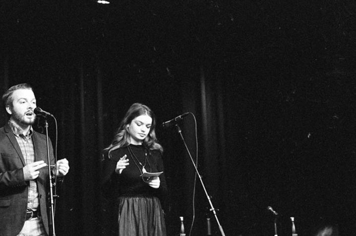 black and white photo of JT Priar and Maddie Marburger presenting at 2018 Fish Tank